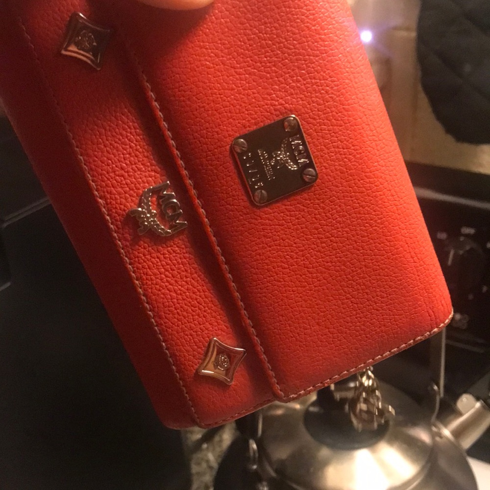 mcm orange color in goodcondition authentic